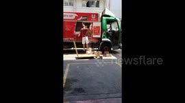 Bad day at the office? Careless delivery driver throws goods on floor at Israeli factory