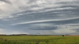Storm clouds roll in over Minnesota field