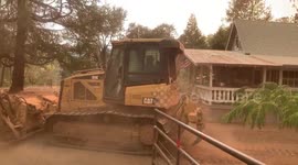 Fire fighting equipment protect home in Napa County from wildfire