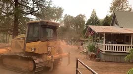 Newsflare Edit - Fire fighting equipment protect home in Napa County from wildfire
