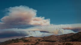 Massive wildfires tear across southern San Mateo County in California, timelapse of the smoke