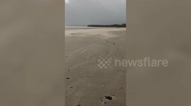 Storm Ellen blows sand away on Irish beach