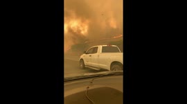 Wildfires burn close to highway as residents evacuate Vacaville, California