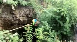 Firefighters rescue stray dog from well in south India
