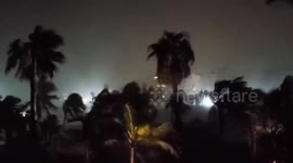 Palm trees sway as Hurricane Genevieve hits coast of Mexico's Baja California