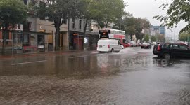 Vehicles drive through flooded streets in Cork, Ireland after Storm Ellen batters city