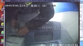 Man caught installing fake card reader on ATM  in China