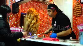 Ice cream vendor teases customers in City God Temple of Shanghai