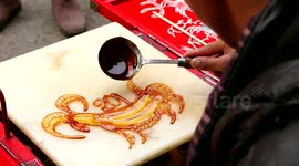 Street vendor makes sheep lollipops to symbolise Chinese New Year