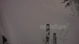 Man skis down hillside in the Peak District, UK