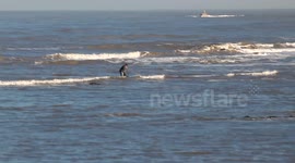 Fisherman Stranded On Rocks On Scarborough Seafront