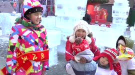 Kids Enjoying China's Snow and Ice Festival
