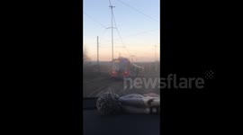 Daredevil spotted 'surfing' tram in Sheffield, UK