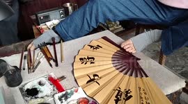 Artist paints using only feet in China