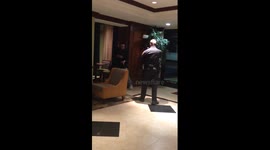 Police tazer man in hotel lobby