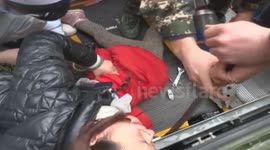 Mother and toddler trapped on escalator in China
