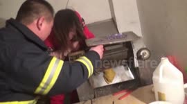 Firemen save woman's hand from mincer ++GRAPHIC WARNING++