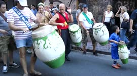Drummer crossing main road in Buenos Aires.