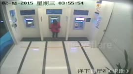 Woman robbed while withdrawing cash from ATM