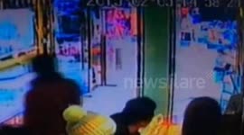 Jaguar car smashes into shop front