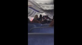 Passengers sing happy birthday to flight attendant