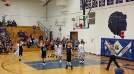 Basketball stuck on rim in final seconds of game