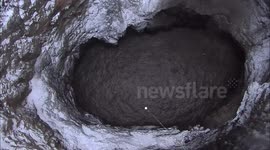 Huge sinkhole threatens Russian habitations