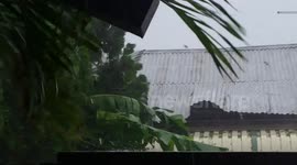 Cyclone winds lift roof off building in QLD, Australia