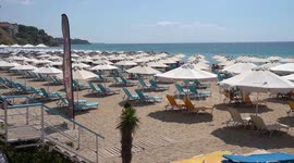 Greek restaurant owners worried as new restrictions in tourist hotspot leave resorts empty