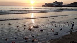 Rubbish on beach at sunset during Covid-19 lockdown