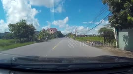 Reckless Cyclist Almost Hit By Oncoming Car