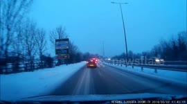 Snow driving, car changes lane into another car.
