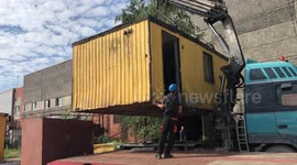 Container putting on car