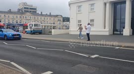 US police cars drive by cop cars in UK
