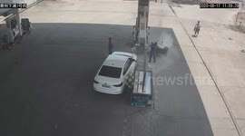 Burning tyre rolls into petrol station after falling off truck in China
