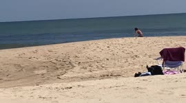Skim boarding in Dewey Beach, Delaware USA