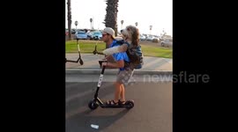 Man's best friend is also man's best ride or die scooter partner