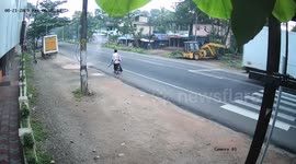 Moment speeding vehicle misses pedestrian by inches caught on camera in India