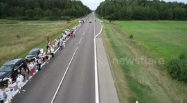 Lithuanians form 32 km long human chain in solidarity with Belarus protesters