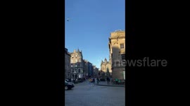 UK: Red Arrows Perform Flypast Over Edinburgh Sky