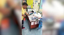 Four snakes caught in teacher's desk at school in Thailand