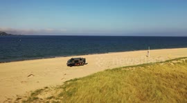 Cool Off Road Truck On Beach - Drone Footage
