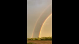 Magnificent double rainbow illuminates Canada's sky