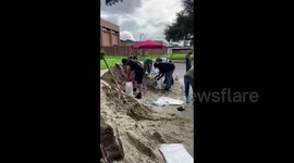 New Orleans residents fill sandbags in anticipation of Hurricane Laura's impact