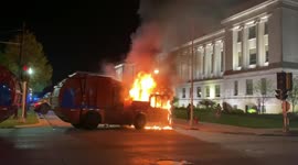 Burning Dump Truck outside Courthouse