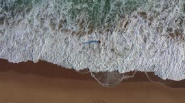 Woman bathing in Kino Beach. bay, waves and sand on a sunny day in a tourist destination in the gulf of california.