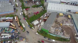 Police launch murder probe after body of elderly man is found inside freezer at a recycling plant
