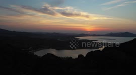 landscape of Cerro Tetakahui with aerial view at sunrise in the desert and the bay of San Carlos, Sonora, Mexico.