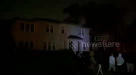 Shining Lights into Houses in downtown Kenosha