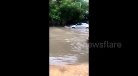 Monsoon rains in Pakistan cause flooded roads and damage